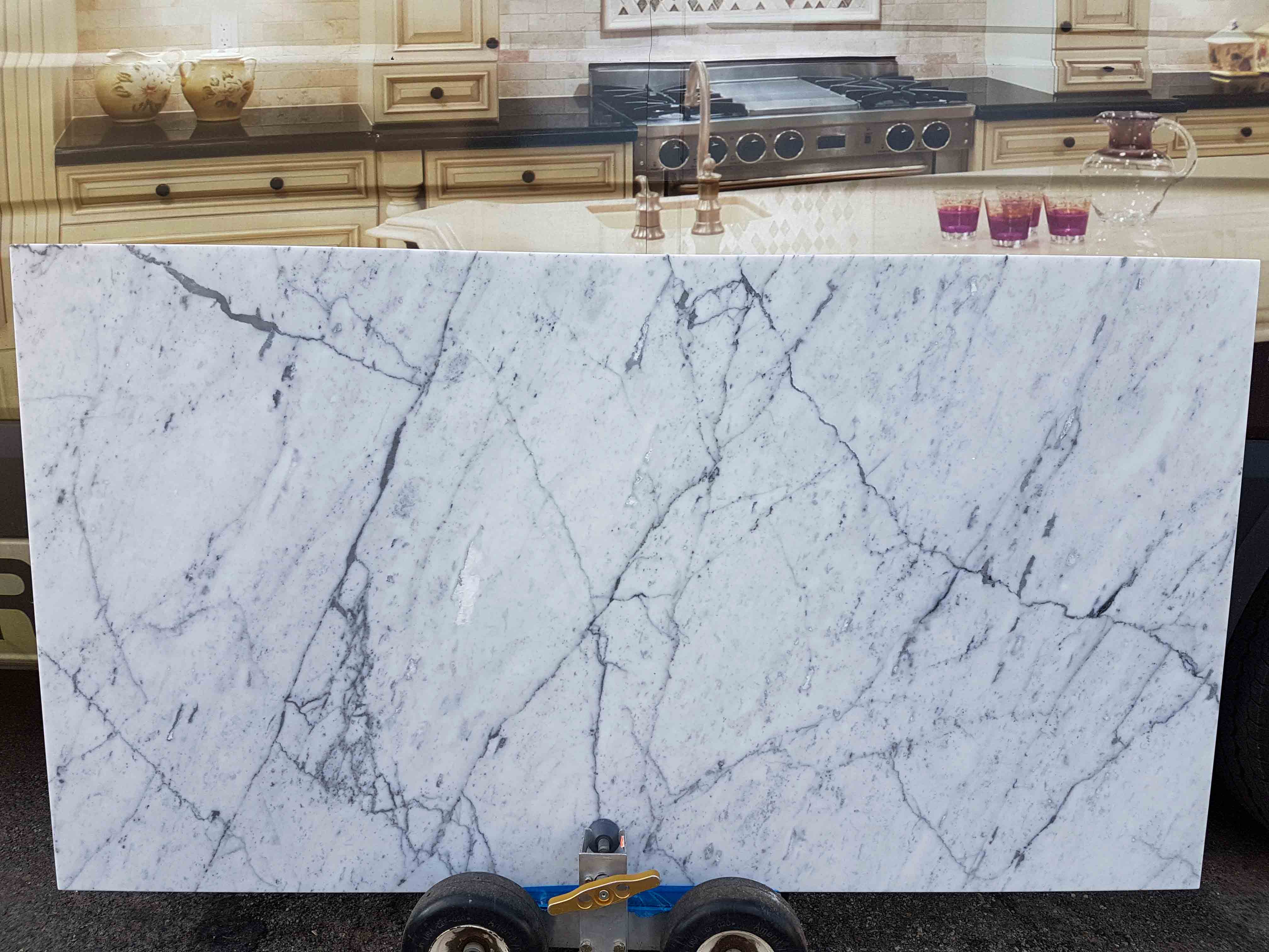 STATUARIETTO CLASICO 3cm HONED 66×36″ Absolute Kitchen & Granite